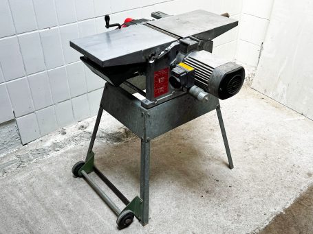 Eine Elektra Beckum HC 260 E Hobelmaschine von Baujahr 1978 mit angeflanschtem Unimex Motor, Messerschutzleiste und Abrichtanschlag fehlt.