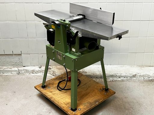 Eine Elektra Beckum HC 260 2800 Watt Hobelmaschine von Baujahr 1992 mit Abrichtanschlag
